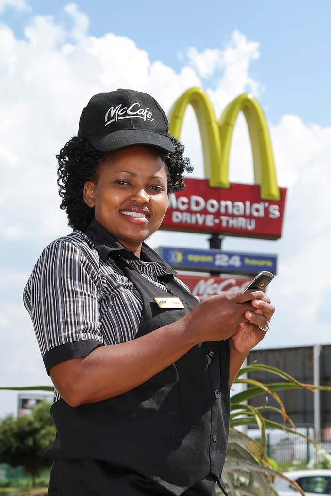 McDonald's staff member in Johannesburg, South Africa, signing up to social networking to communicate faster. Source: IBM